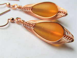 orange cultured sea glass wrapped in copper wirewire